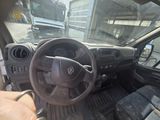 dashboard of a car with a steering wheel and dashboard controls