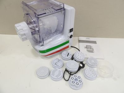 an image of a blender with many items on the counter
