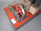 a small model of a steam engine on display