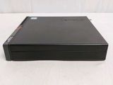 the back of a dvd player sitting on top of a white surface