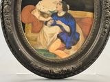 une photo d'un tableau représentant une femme tenant un chat