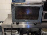 a microwave sitting on a counter in a kitchen