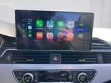 the dashboard of a car with a display of apps on the screen