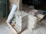 a pile of bricks sitting on a pallet in a warehouse