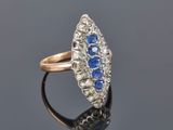 an antique sapphire and diamond cluster ring