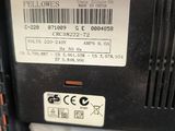 a close up of a microwave with a barcode on it
