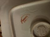 a close up of a toilet with the lid down