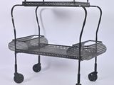 a black metal trolley with two baskets on it