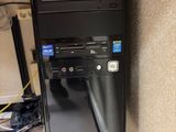 a computer that is sitting on top of a stand