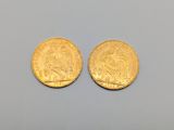 deux souverains d'or, dont l'un est à l'effigie d'une tête et l'autre à l'effigie d'une tête