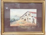 un vieux tableau représentant une grange au toit rouge, dans un cadre doré