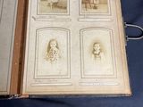 a book with pictures of children in it on a table
