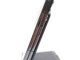a cell phone that is sitting on top of a stand