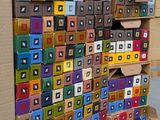 many boxes stacked on top of each other on the floor