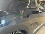 a close up of a car in a garage