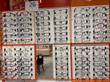 many glasses on display in a store window