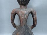 an image of a couple of figurines sitting next to each other