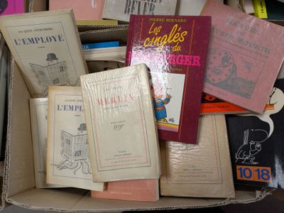 a box full of books that are sitting on top of a table
