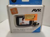 a box with a camera inside of it on a table
