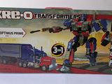 a box with a picture of a toy truck and a toy truck