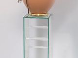 a lamp that is sitting on top of a glass table