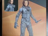 Sur la boîte de la figurine, on voit une femme en combinaison spatiale.