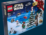 une boîte contenant des sets Lego Star Wars sur fond bleu