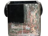 a picture of a black and white vase with a painting on it