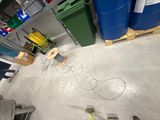 a picture of a room that has a lot of tools on the floor