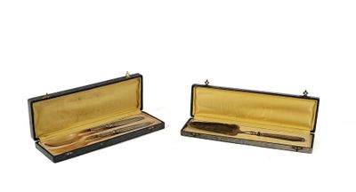 two open cases that have a pen and a pencil inside of them