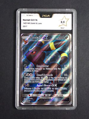 a close up of a card on a table with a black background