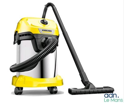 un aspirateur jaune surmonté d'un tuyau noir