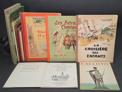 Plusieurs livres pour enfants sont alignés sur une surface noire