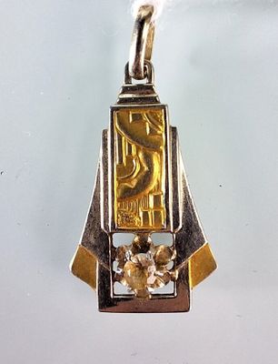 Pendentif Art déco en or deux tons et pierre blanche. - Photo 1
