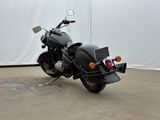 a motorcycle that is parked in a parking lot