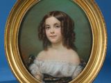 portrait of a young girl in a white dress in a gold frame