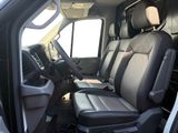 a view of the inside of a vehicle with the driver ' s seat up