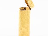 an image of a lighter that is sitting on top of a table