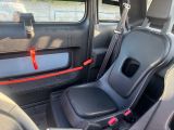 a seat in the back of a car that is empty