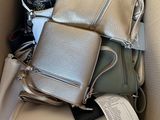 a box full of purses and other items in it