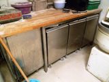 an image of a kitchen with a lot of clutter on the counter