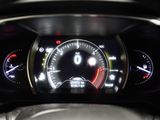 the dashboard of a car with a speedometer, gauges, and other instruments