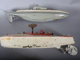 a small boat and a small boat on a shelf