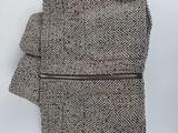 a close up of a piece of clothing on a white surface