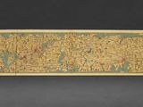 an old map of the world is hanging on a wall