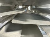 a close up view of a metal object with many blades