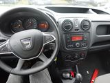 dashboard of a small car with a steering wheel and dashboard controls