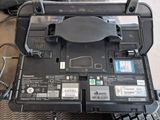 a laptop computer sitting on top of a table