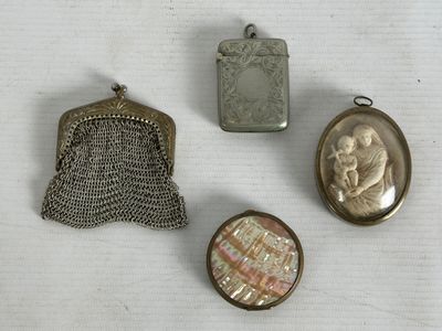 several different types of jewelry are displayed on a white surface
