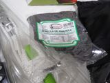 a bag of charcoal sitting on a counter next to a pair of scissors